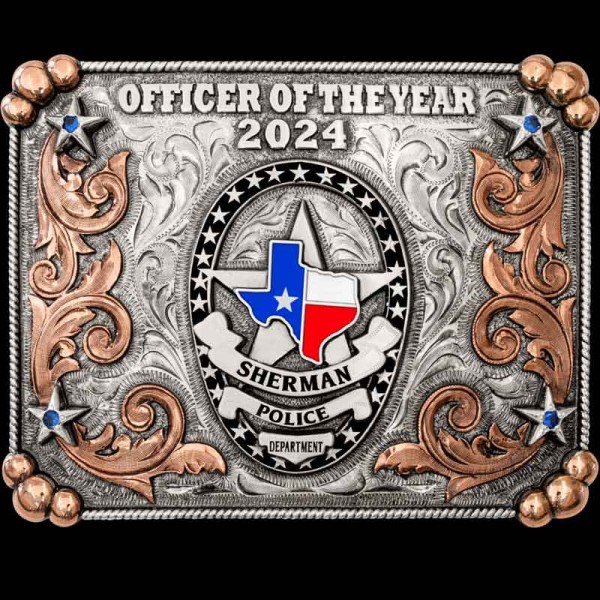 "Our Sherman belt buckle is not just for the Officer of the Year.  Crafted on a hand-engraved  German base, featuring a traditional rope edge and Copper pearl beads in each corner. This design is detailed with our Copper western inspired scrollwork a